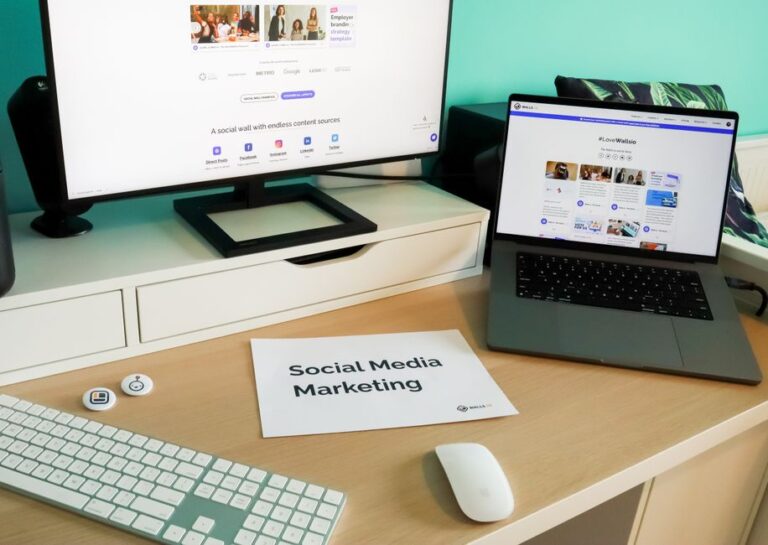 A small business owner takes a photo of a colorful notice board to share on a mobile phone in a cozy workspace.